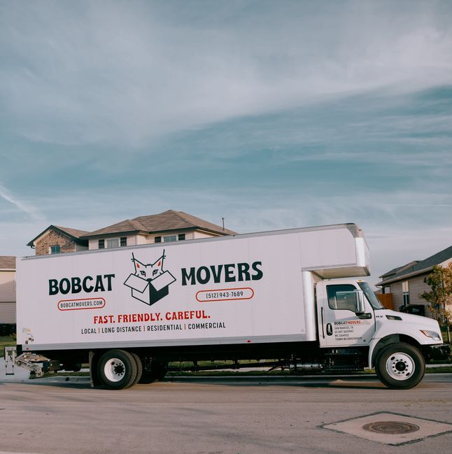 Bobcat Movers branded box truck ready for a load and unload job in San Marcos, TX